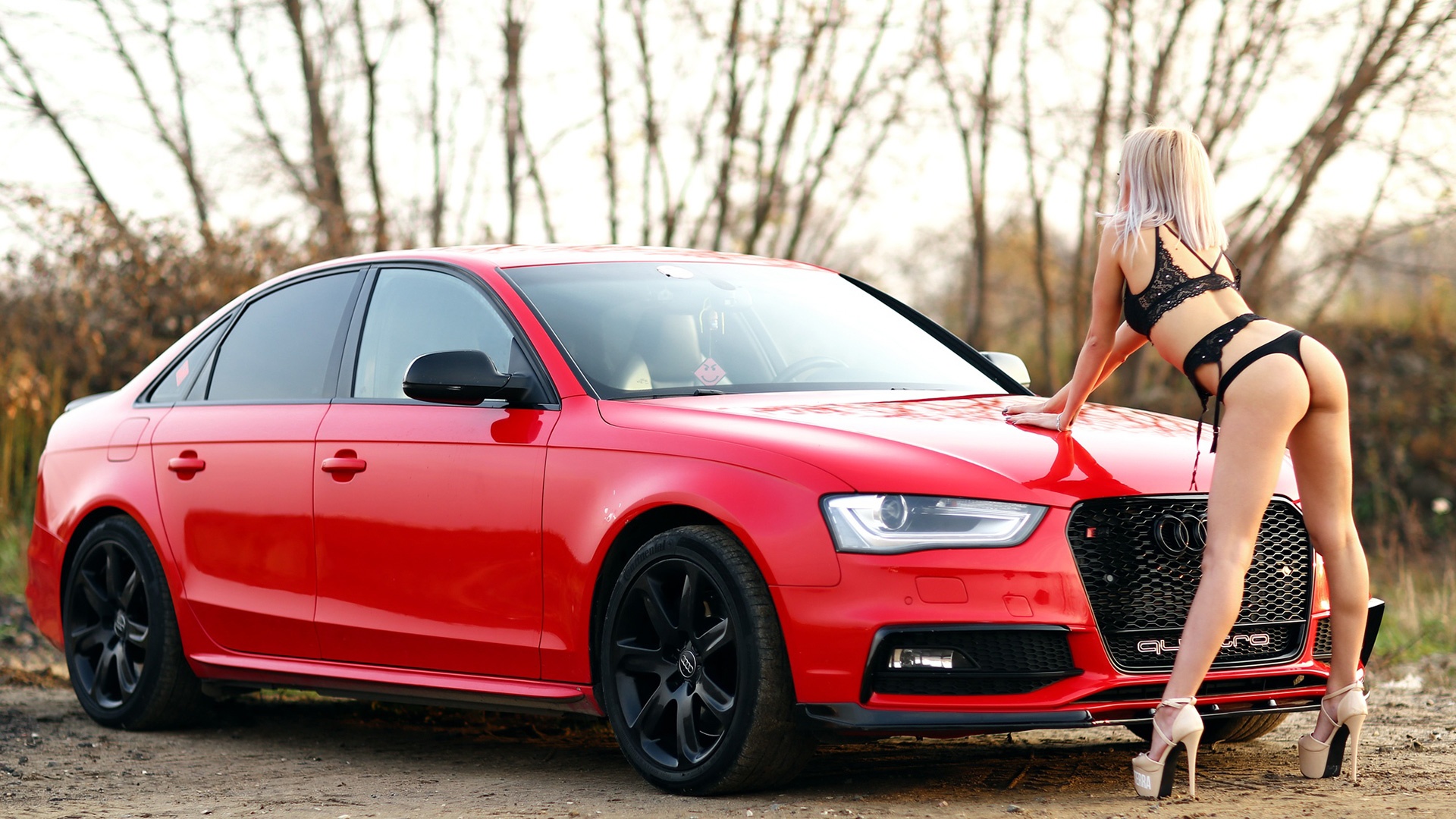 Audi A4 Quattro and bikini blonde