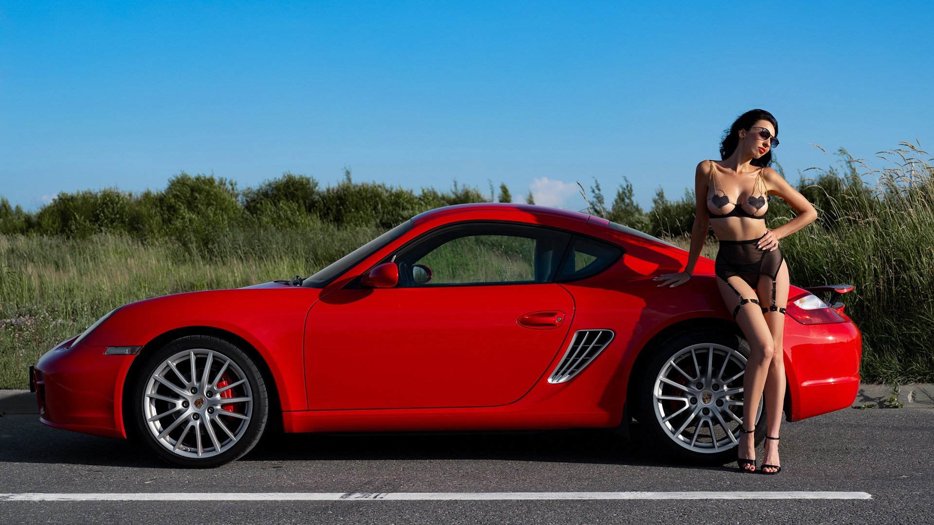 Porsche 911 and brunette
